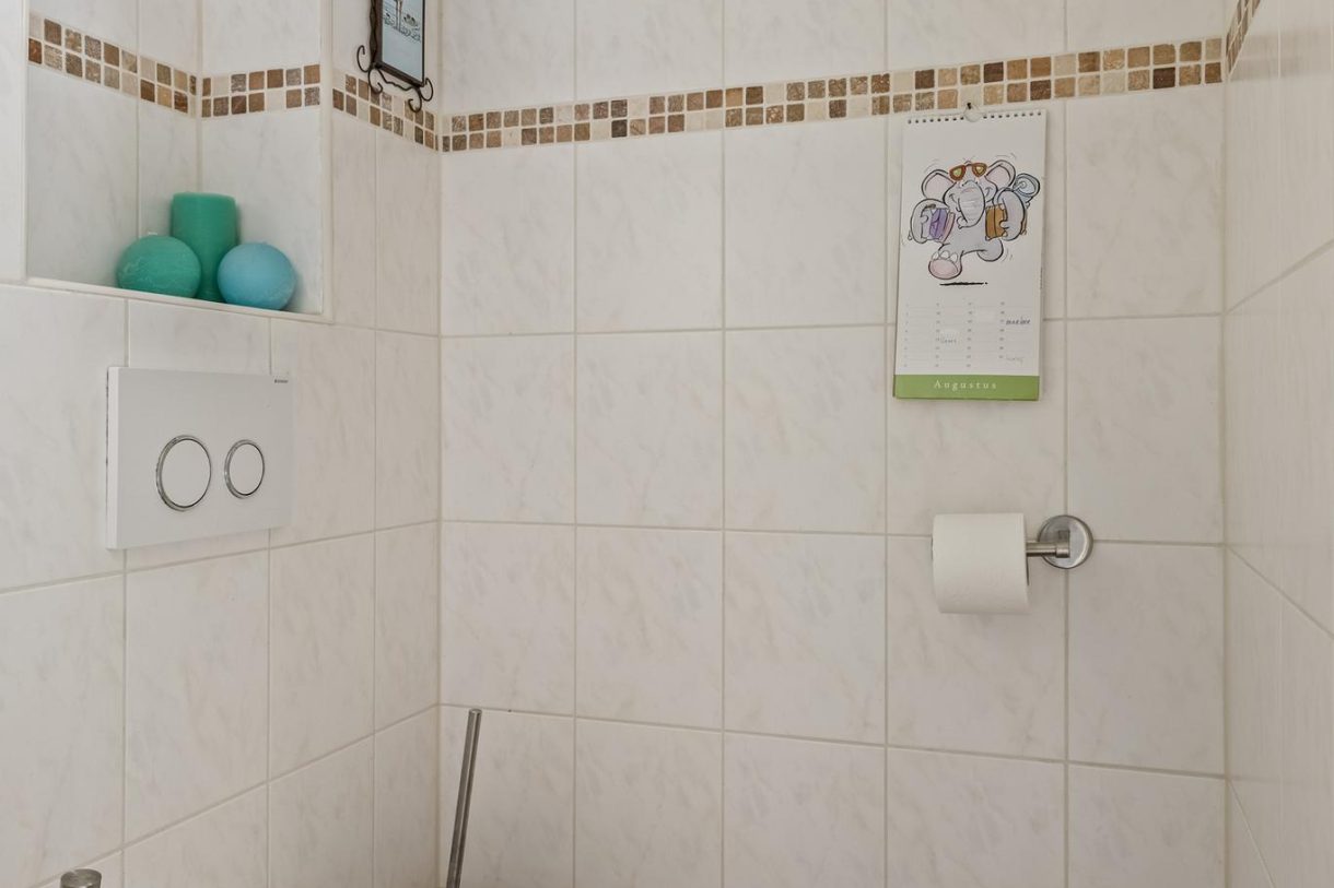 Te koop: Foto Woonhuis aan de Kerkstraat 10 in Munnekezijl