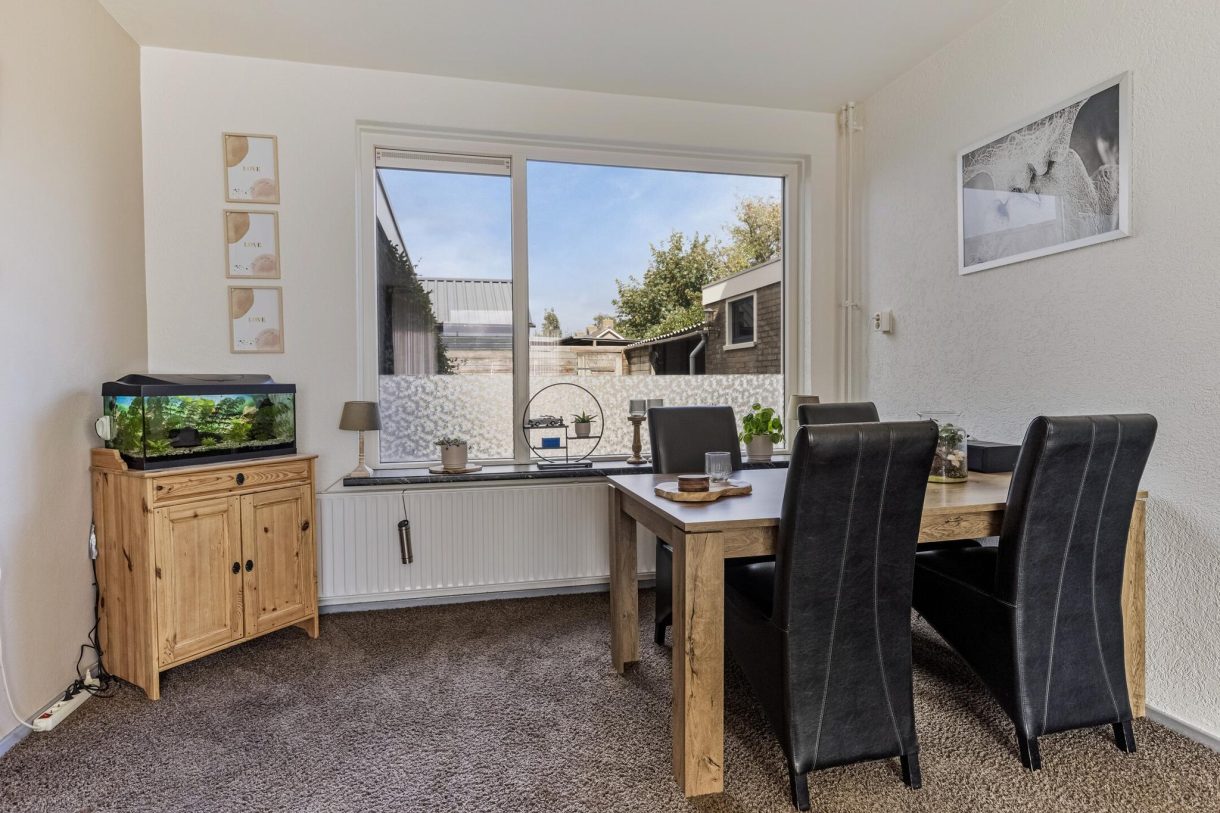 Te koop: Foto Woonhuis aan de Kerkstraat 10 in Munnekezijl