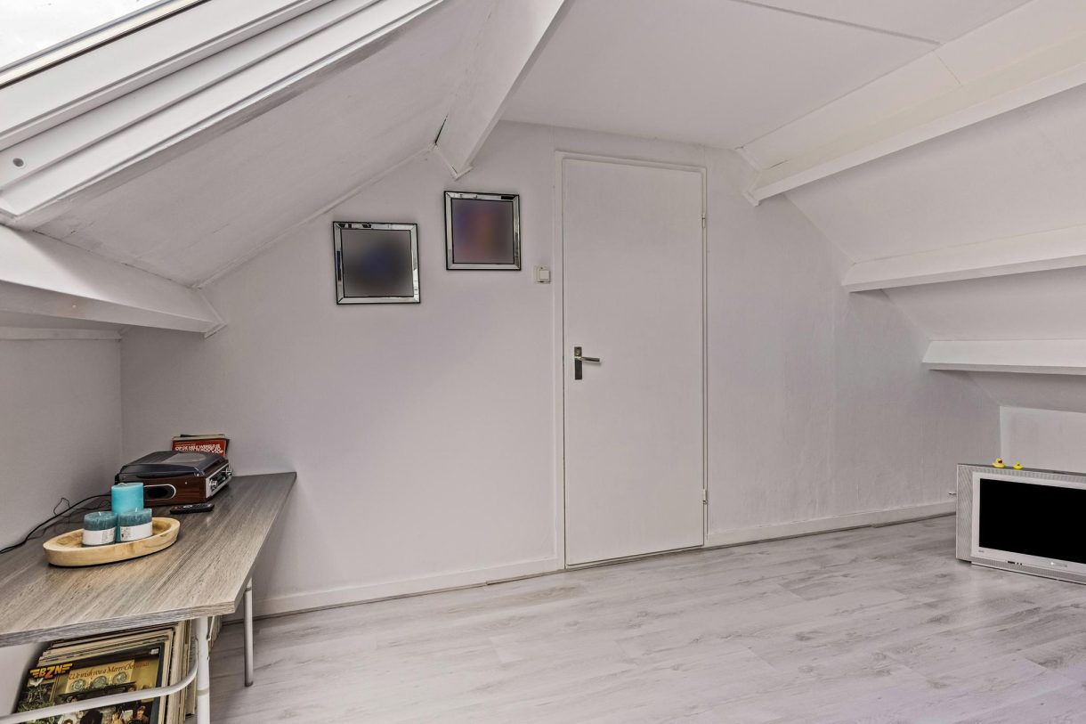 Te koop: Foto Woonhuis aan de Kerkstraat 10 in Munnekezijl