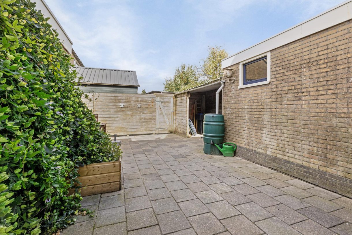 Te koop: Foto Woonhuis aan de Kerkstraat 10 in Munnekezijl